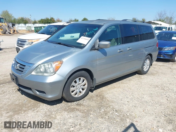 2010 Honda Odyssey EX with VIN 5FNRL3H43AB002674, listed as a IAAI auction lot 41769655 with 217,872 mi miles. Bid and sale history available at carsss.com. Image 2.
