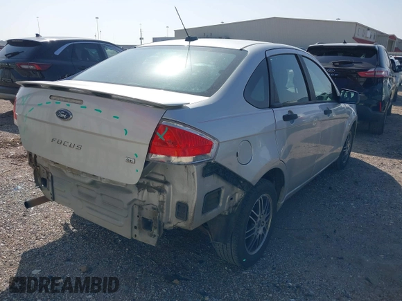2011 Ford Focus SE with VIN 1FAHP3FN5BW147620, listed as a IAAI auction lot 41775563 with 228,222 mi miles. Bid and sale history available at carsss.com. Image 4.