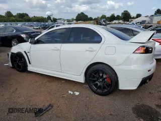 2011 Mitsubishi Lancer Evolution GSR with VIN JA32W8FV4BU033621, listed as a Copart auction lot 71182174 with 129,131 mi miles and Salvage Title. Bid and sale history available at carsss.com. Image 2.