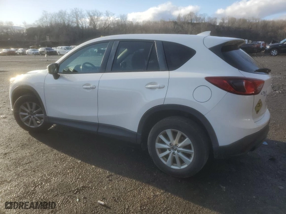 2016 Mazda CX-5 Touring with VIN JM3KE4CY2G0749547, listed as a Copart auction lot 49955475 with 102,519 mi miles and Salvage Title. Bid and sale history available at carsss.com. Image 2.