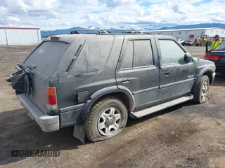 1996 Honda Passport z VIN 4S6CM58V7T4413421, wystawiony jako IAAI lot #41870561 z przebiegiem 221 905 mil mil oraz . Historia ofert i sprzedaży dostępna na DreamBid. Obrazek 4.