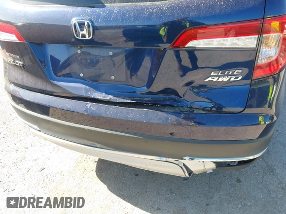 2020 Honda Pilot Elite with VIN 5FNYF6H02LB054348, listed as a IAAI auction lot 42302525 with 43,916 mi miles and . Bid and sale history available at DreamBid. Image 6.