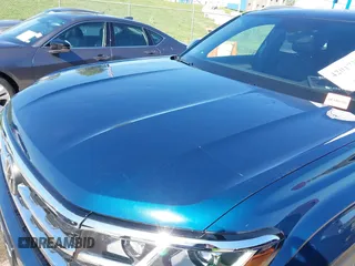 2021 Volkswagen Atlas SE z VIN 1V2KE2CA7MC220524, wystawiony jako IAAI lot #42017287 z przebiegiem 29 380 mil mil oraz . Historia ofert i sprzedaży dostępna na DreamBid. Obrazek 6.