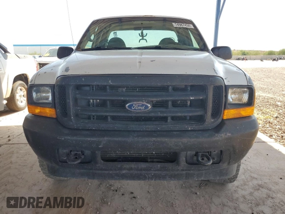 2001 Ford F-250 with VIN 3FTNX21L21MA60236, listed as a Copart auction lot 74987434 with 147,175 mi miles and Salvage title. Bid and sale history available at DreamBid. Image 5.