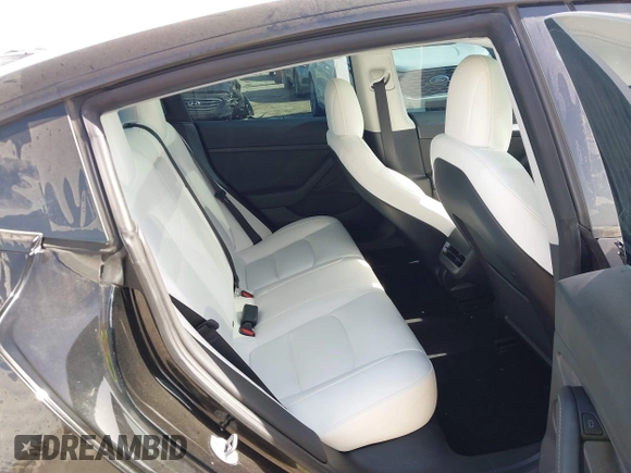 2023 Tesla Model 3 z VIN 5YJ3E1EA7PF465540, wystawiony jako IAAI lot #42261848 z przebiegiem 15 885 mil mil oraz . Historia ofert i sprzedaży dostępna na DreamBid. Obrazek 8.