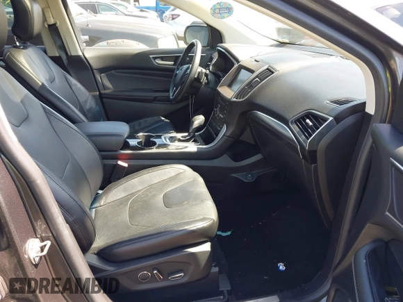 2015 Ford Edge Titanium z VIN 2FMPK4K83FBB30411, wystawiony jako IAAI lot #42230235 z przebiegiem 69 094 mil mil oraz . Historia ofert i sprzedaży dostępna na DreamBid. Obrazek 5.