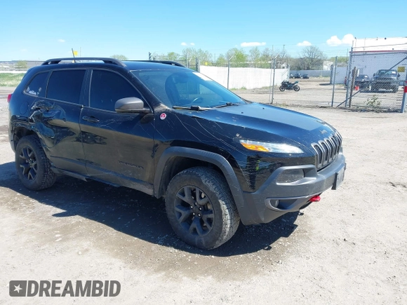 2018 Jeep Cherokee Trailhawk Leather Plus with VIN 1C4PJMBXXJD572667, listed as a IAAI auction lot 42216477 with 85,890 mi miles and . Bid and sale history available at DreamBid. Image 1.