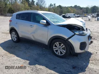 2018 Kia Sportage LX with VIN KNDPM3AC6J7422408, listed as a IAAI auction lot 41918342 with 104,385 mi miles and . Bid and sale history available at carsss.com. Image 1.