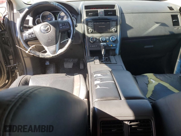 2015 Mazda CX-9 Touring z VIN JM3TB2CA5F0455109, wystawiony jako Copart lot #46899815 z przebiegiem 131 847 mil mil oraz Szkoda całkowita • Salvage title. Historia ofert i sprzedaży dostępna na DreamBid. Obrazek 8.