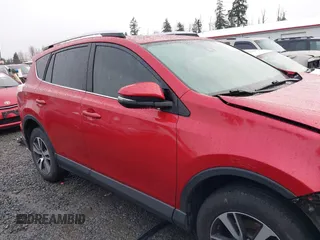 2016 Toyota RAV4 XLE with VIN JTMRFREV5GJ092337, listed as a IAAI auction lot 41597345 with 84,292 mi miles and . Bid and sale history available at DreamBid. Image 14.