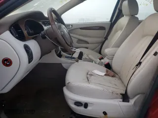 2004 Jaguar X-Type with VIN SAJEA51C54WD60087, listed as a Copart auction lot 77611854 with 0 mi miles and Salvage Title. Bid and sale history available at carsss.com. Image 7.