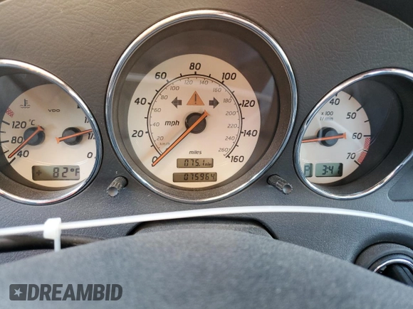 2004 Mercedes-Benz SLK-Class with VIN WDBKK65FX4F300214, listed as a Copart auction lot 82160974 with 75,964 mi miles and Salvage Title. Bid and sale history available at carsss.com. Image 9.