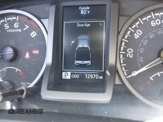 2023 Toyota Tacoma SR with VIN 3TMCZ5AN3PM590101, listed as a IAAI auction lot 42338670 with 12,970 mi miles and . Bid and sale history available at DreamBid. Image 15.