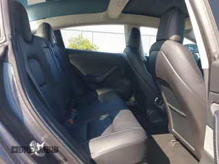 2018 Tesla Model 3 Long Range Battery with VIN 5YJ3E1EA4JF024102, listed as a IAAI auction lot 42100621 with 86,298 mi miles and . Bid and sale history available at DreamBid. Image 8.