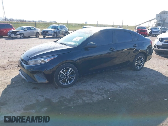 2023 Kia Forte LXS with VIN 3KPF24AD1PE511666, listed as a IAAI auction lot 41832551 with 112,005 mi miles and . Bid and sale history available at DreamBid. Image 2.