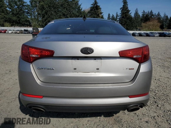 2011 Kia Optima EX z VIN KNAGN4A77B5096621, wystawiony jako Copart lot #53087945 z przebiegiem 189 899 mil mil oraz Szkoda całkowita • Salvage title. Historia ofert i sprzedaży dostępna na DreamBid. Obrazek 6.