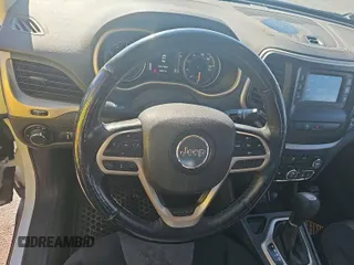 2017 Jeep Cherokee Sport with VIN 1C4PJLABXHW660505, listed as a IAAI auction lot 42680671 with 98,907 mi miles and . Bid and sale history available at DreamBid. Image 26.