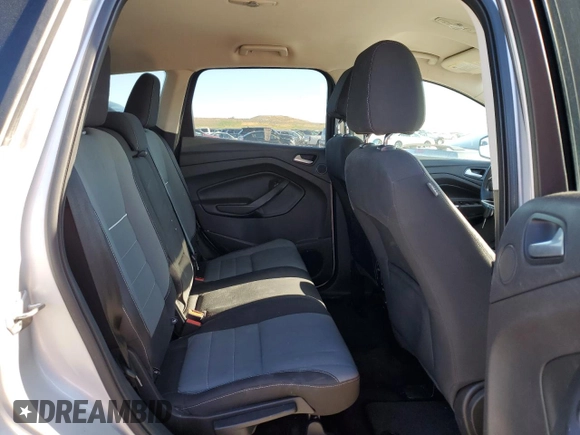 2013 Ford Escape SE z VIN 1FMCU9G96DUD12621, wystawiony jako Copart lot #56176175 z przebiegiem 85 597 mil mil oraz Szkoda całkowita • Salvage title. Historia ofert i sprzedaży dostępna na DreamBid. Obrazek 11.
