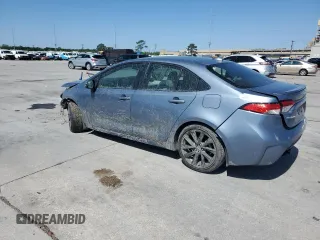 2023 Toyota Corolla Hybrid LE with VIN JTDBCMFE6P3015167, listed as a Copart auction lot 52114915 with 35,334 mi miles and Salvage Title. Bid and sale history available at carsss.com. Image 2.