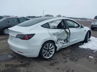 2018 Tesla Model 3 Long Range Battery with VIN 5YJ3E1EB2JF089006, listed as a IAAI auction lot 41186372 with Not Provided miles and . Bid and sale history available at DreamBid. Image 4.