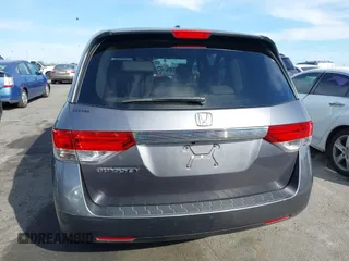 2014 Honda Odyssey EX-L with VIN 5FNRL5H64EB055807, listed as a IAAI auction lot 41760758 with 144,346 mi miles and . Bid and sale history available at carsss.com. Image 16.