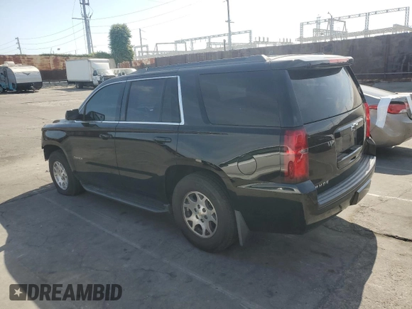 2018 Chevrolet Tahoe LS with VIN 1GNSCAKC9JR201994, listed as a Copart auction lot 53100735 with 182,460 mi miles and Salvage title. Bid and sale history available at DreamBid. Image 2.