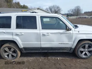 2016 Jeep Patriot Latitude with VIN 1C4NJPFA2GD562612, listed as a IAAI auction lot 41639913 with 120,823 mi miles and . Bid and sale history available at DreamBid. Image 14.