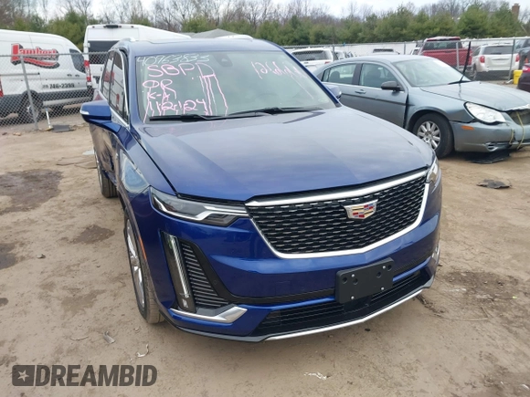 2023 Cadillac XT6 AWD Premium Luxury with VIN 1GYKPDRS2PZ126666, listed as a IAAI auction lot 40963833 with 23,535 mi miles and . Bid and sale history available at DreamBid. Image 1.