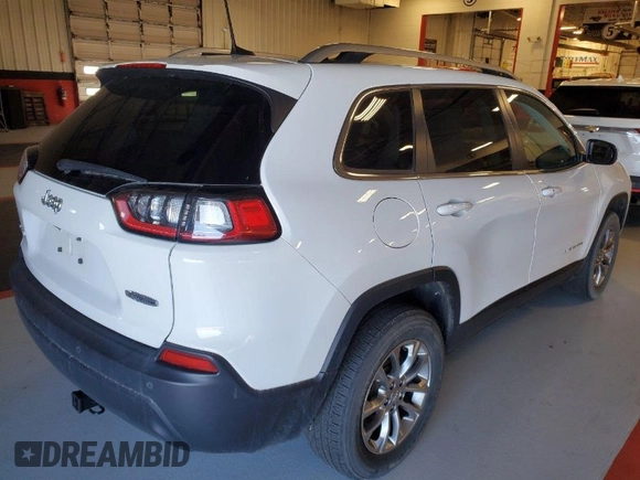 2021 Jeep Cherokee Altitude with VIN 1C4PJMLB1MD221315, listed as a IAAI auction lot 42097716 with 65,828 mi miles. Bid and sale history available at carsss.com. Image 1.