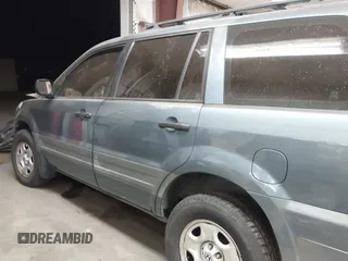 2005 Honda Pilot LX z VIN 2HKYF18135H537704, wystawiony jako IAAI lot #41091540 z przebiegiem Nie podano mil oraz . Historia ofert i sprzedaży dostępna na DreamBid. Obrazek 15.