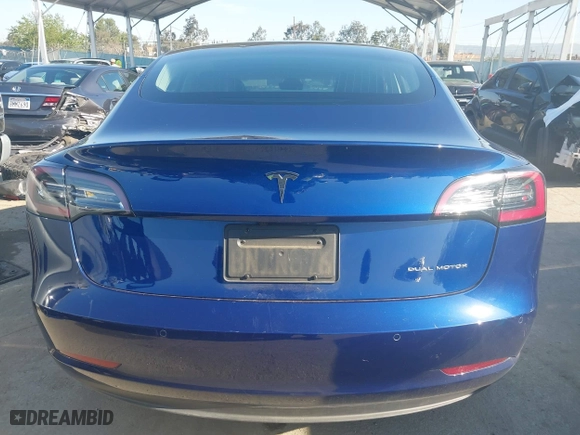 2019 Tesla Model 3 Long Range with VIN 5YJ3E1EB3KF497841, listed as a IAAI auction lot 41969728 with 21,127 mi miles. Bid and sale history available at carsss.com. Image 17.
