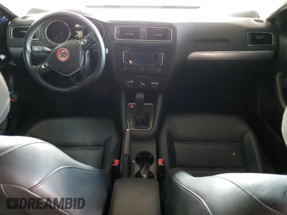 2015 Volkswagen Jetta SE with VIN 3VWD17AJ4FM319385, listed as a Copart auction lot 58380125 with 124,877 mi miles and Salvage title. Bid and sale history available at DreamBid. Image 8.