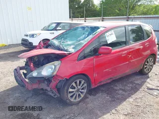 2013 Honda Fit Sport z VIN JHMGE8H51DC080183, wystawiony jako IAAI lot #42178982 z przebiegiem 174 133 mil mil oraz . Historia ofert i sprzedaży dostępna na DreamBid. Obrazek 17.