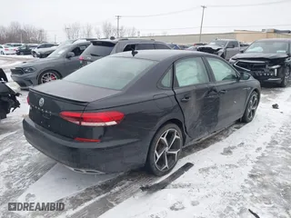 2020 Volkswagen Passat 2.0T R-Line with VIN 1VWMA7A3XLC020708, listed as a IAAI auction lot 41499954 with 49,158 mi miles. Bid and sale history available at carsss.com. Image 4.