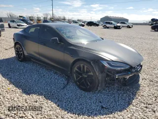 2021 Tesla Model S Plaid с VIN 5YJSA1E64MF451576, выставлен на аукционе Copart как лот 45425625 с пробегом 40 563 миль миль и Списание • Salvage title. История ставок и продаж доступна на DreamBid. Изображение 4.