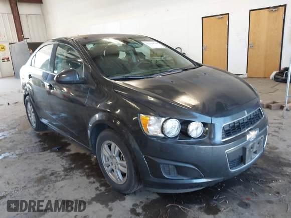 2014 Chevrolet Sonic LT z VIN 1G1JC5SH2E4199864, wystawiony jako IAAI lot #42370631 z przebiegiem 59 781 mil mil oraz . Historia ofert i sprzedaży dostępna na DreamBid. Obrazek 1.