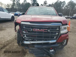 2021 GMC Canyon 4WD AT4 w/Leather with VIN 1GTG6FEN2M1224875, listed as a Copart auction lot 45553885 with 81,495 mi miles and Salvage Title. Bid and sale history available at carsss.com. Image 5.