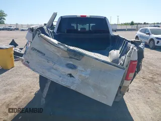 2017 Ford F-150 XL with VIN 1FTFW1EG4HKD98317, listed as a IAAI auction lot 42238325 with 124,494 mi miles and . Bid and sale history available at DreamBid. Image 6.