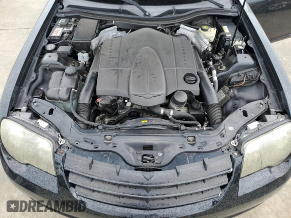 2005 Chrysler Crossfire z VIN 1C3AN59L95X032917, wystawiony jako Copart lot #75003614 z przebiegiem Nie podano mil oraz Szkody całkowita. Historia ofert i sprzedaży dostępna na DreamBid. Obrazek 11.