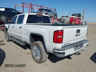 2019 GMC Sierra 2500HD Denali with VIN 1GT12SEY8KF139611, listed as a IAAI auction lot 41641028 with 69,776 mi miles. Bid and sale history available at carsss.com. Image 3.