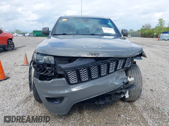 2021 Jeep Grand Cherokee Laredo E with VIN 1C4RJFAG4MC700384, listed as a IAAI auction lot 42192672 with 54,525 mi miles and . Bid and sale history available at DreamBid. Image 13.