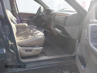 1999 Jeep Grand Cherokee Limited with VIN 1J4GW68S8XC588500, listed as a IAAI auction lot 41484787 with 161,961 mi miles. Bid and sale history available at carsss.com. Image 5.