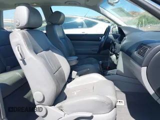 2004 Volkswagen GTI 1.8T z VIN 9BWDE61JX44002081, wystawiony jako IAAI lot #42342072 z przebiegiem 163 641 mil mil oraz . Historia ofert i sprzedaży dostępna na DreamBid. Obrazek 5.