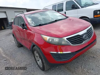 2012 Kia Sportage LX z VIN KNDPB3A25C7182526, wystawiony jako IAAI lot #42420283 z przebiegiem 150 214 mil mil oraz . Historia ofert i sprzedaży dostępna na DreamBid. Obrazek 1.