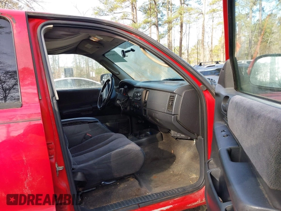 2004 Dodge Dakota Sport with VIN 1D7HG38N64S677103, listed as a IAAI auction lot 41665245 with 212,470 mi miles and . Bid and sale history available at carsss.com. Image 5.