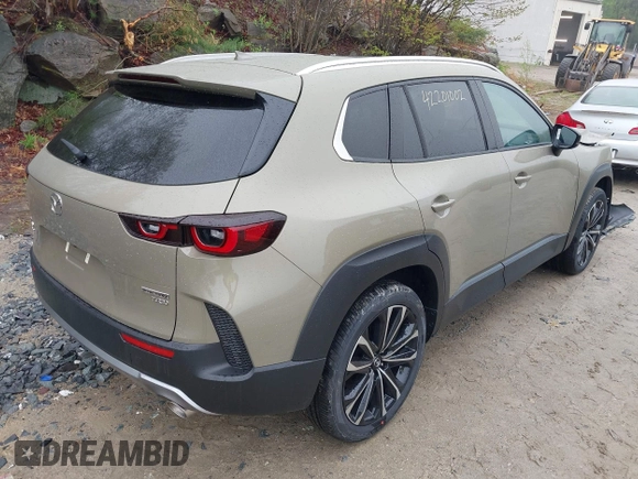 2025 Mazda CX-50 Premium z VIN 7MMVABDY2SN339010, wystawiony jako IAAI lot #42201002 z przebiegiem 36 mil mil oraz . Historia ofert i sprzedaży dostępna na DreamBid. Obrazek 4.