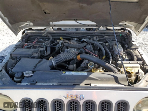 2010 Jeep Wrangler Unlimited Rubicon with VIN 1J4BA6H12AL107485, listed as a Copart auction lot 48802825 with 123,299 mi miles and Salvage title. Bid and sale history available at DreamBid. Image 13.