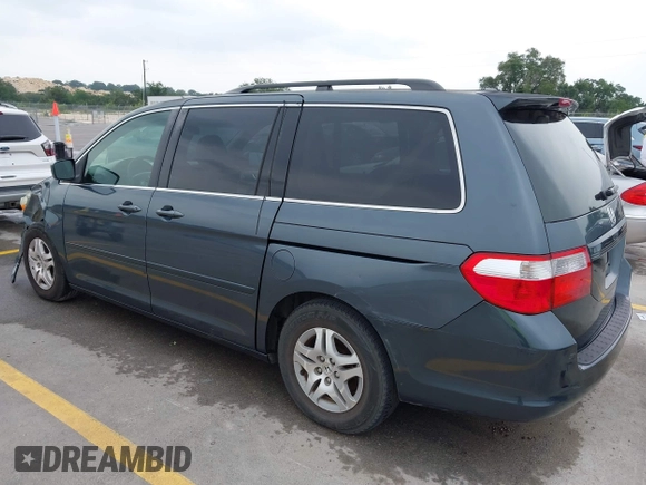2005 Honda Odyssey EX-L with VIN 5FNRL38775B110232, listed as a IAAI auction lot 42301513 with 277,389 mi miles and . Bid and sale history available at DreamBid. Image 3.