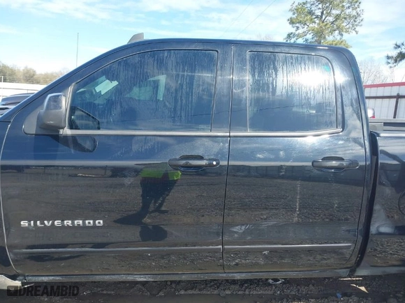 2015 Chevrolet Silverado 1500 LT with VIN 1GCVKREH2FZ433780, listed as a IAAI auction lot 41634096 with 127,609 mi miles. Bid and sale history available at carsss.com. Image 14.