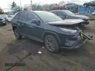 2024 Toyota RAV4 Hybrid XLE Premium with VIN JTMB6RFV4RD137902, listed as a Copart auction lot 86013364 with 9,330 mi miles and Salvage Title. Bid and sale history available at DreamBid. Image 4.